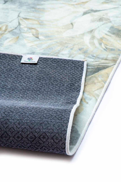 Trópusi Árnyak – Elegáns Levélmintás Szőnyeg