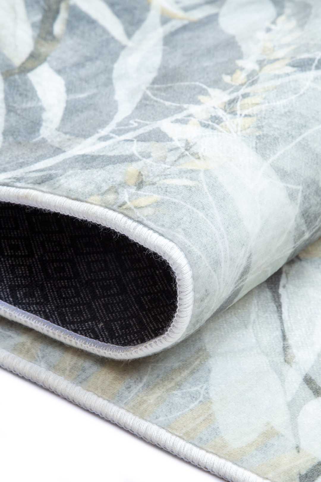 Trópusi Árnyak – Elegáns Levélmintás Szőnyeg